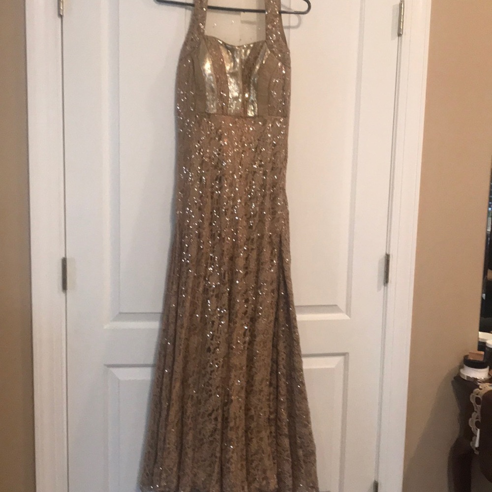 Gold sequence dress.